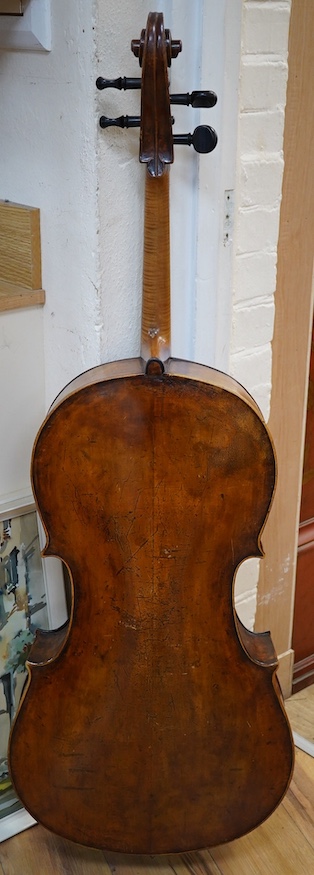 An early to mid 19th century German cello, attributed to Simon Voigt, Simon Voigt label inside with indistinct date, body 74.5cm, with a hard case. Condition - fair to good.